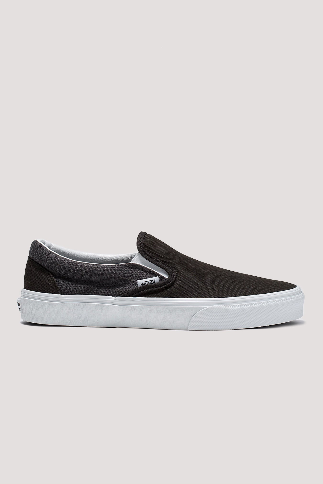 Vans classic slip outlet on black on feet