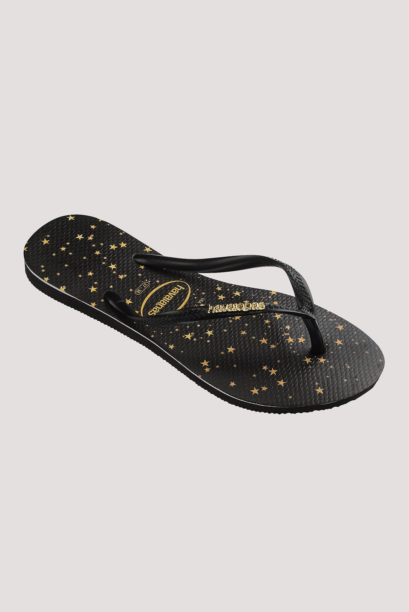 Havaianas slim logo hot sale metallic black gold